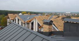 Pointed standing seam roofs on residential complex 